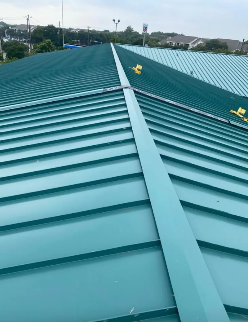 Green commercial metal roof ridge and valley for Metal Roof Repair in South Gate Ridge